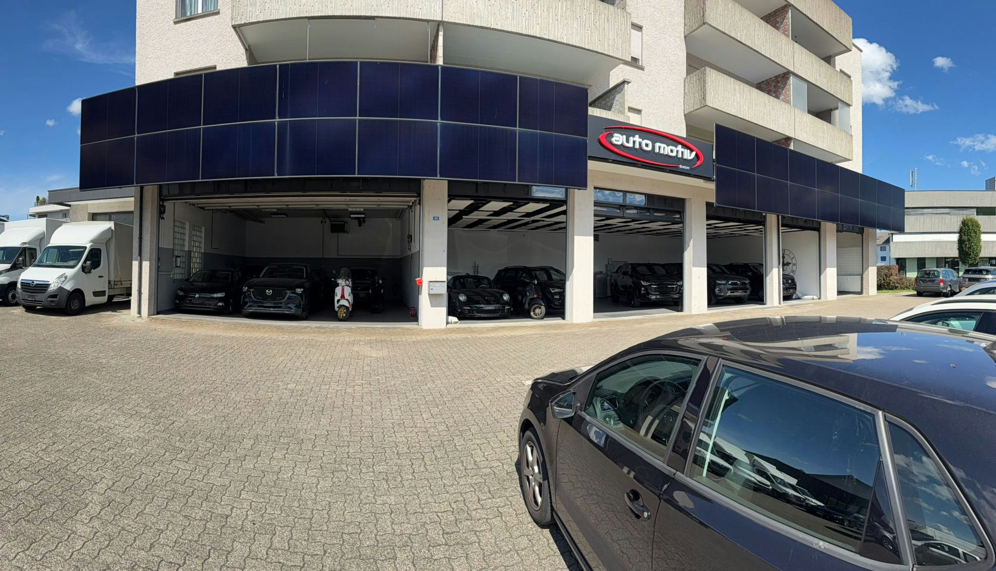 Aussenansicht der Auto Motiv GmbH an der Weinfelderstrasse 88 in Amriswil mit Logo